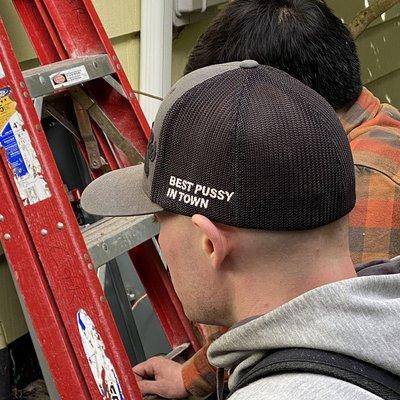 No business owner should allow one of his employees to wear such a hat on the job... and the owner should have called to apologize.