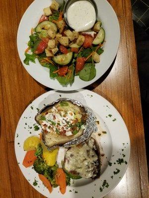 Perfectly cooked 8 oz. fillet, with loaded baked potato, grilled veggies and salad.  Magnifico!  I love Cardigans.