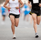 Two runners leading the competition at city marathon