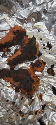 Jumbo chicken wings burned and cold and it looks like cook on flat grill and microwave