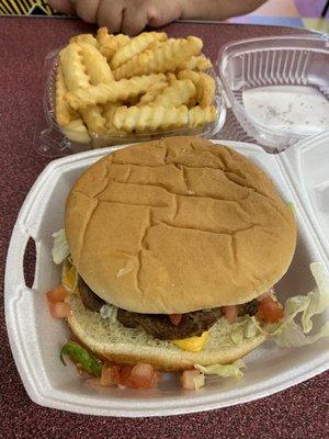 Cheeseburger with fries.