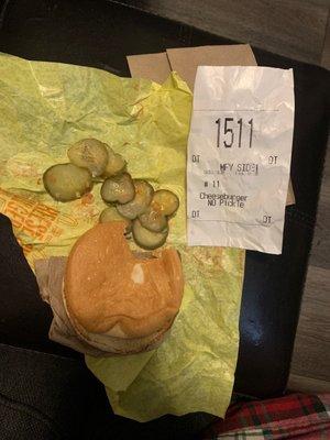 a whole damn pickle chopped up is what's in this picture, and a receipt that says NO PICKLES... this was some aggressive BS