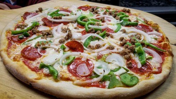 Sausage, pepperoni, green peppers and onions!