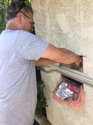 Replacing a shower valve from the exterior. I also patched the stucco.