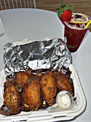 Lemon pepper wings and blackberry lemonade.