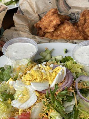 Fried chicken salad (boiled egg added) and chicken on the side