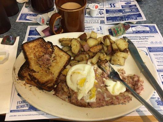 Corned beef hash with poached eggs, home fries, and gluten-free bread w/butter. Soooo good.