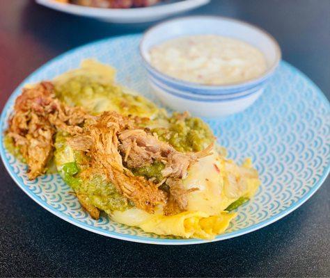 Pulled Pork 4 egg omelet stuffed with jack cheese, pulled pork topped with green chili salsa w/Gouda grits/best omelet i've ever had :)...