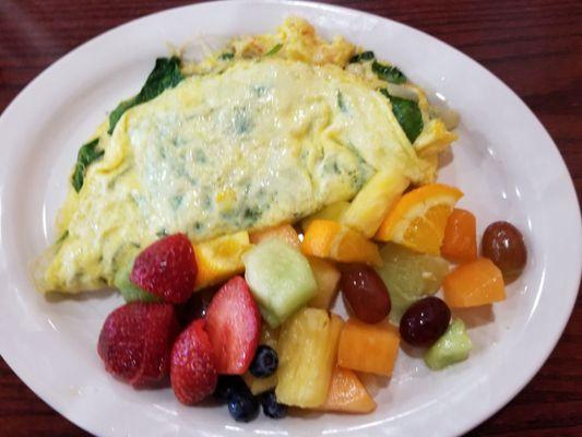 Lobster Omelet with three cheeses, spinach and onion, with side of sweet ripe fresh fruit and English muffin!