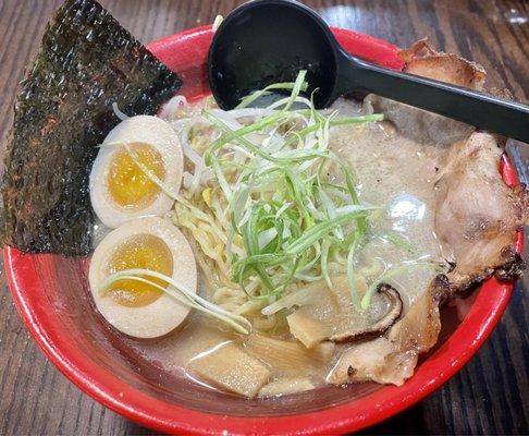 Tonkotsu Ramen. sliced grilled pork, marinated egg, bamboo shoots, bean sprouts, julienned onions and roasted seaweed.