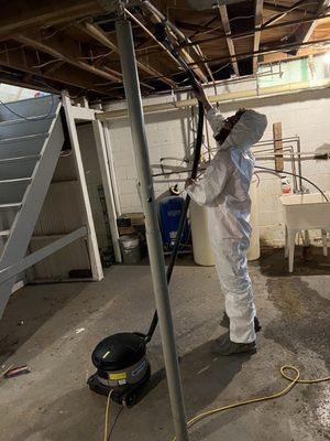 HEPA Vacuuming after sewage cleanup and mold remediation in Oakland, MI.