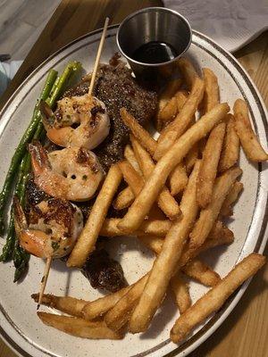 Grilled New York Steak & Shrimp. The entree only comes with Asparagus. We added Seasoned Fries