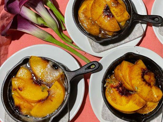 A vegan dessert made of peaches, citrus thyme, and local honey.