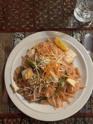 Pad thai with tofu. The noodles had a pink hue to them.