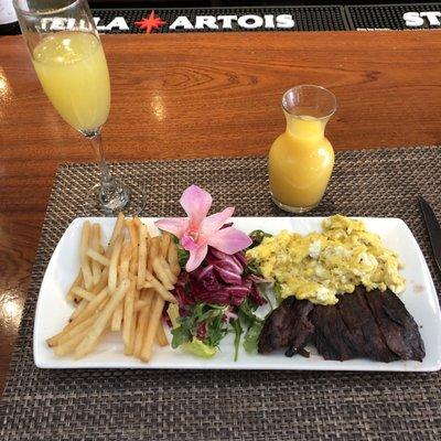 Steak and eggs with unlimited mimosa brunch