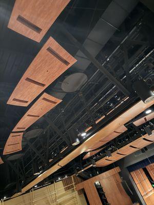 Acoustic hardwood additions on ceiling