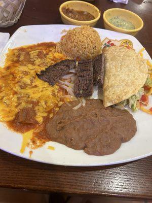 Cheese enchilada, rice, beans, fajitas and soft taco