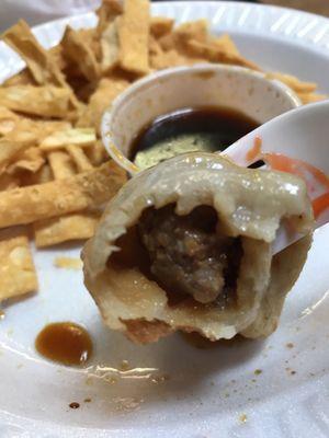 Meaty and tasty fried dumplings. Thicker wrapper (think momo), but very tasty on a rare, cold North Carolina evening.