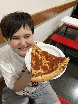 My kids and I live it. To go orders are cut more than in store. This is 2 slices