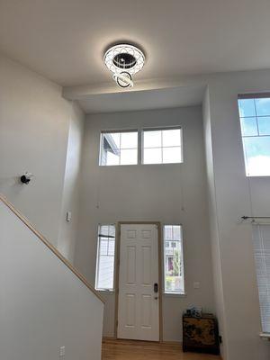 New chandelier install on 20' ceiling and interior painting