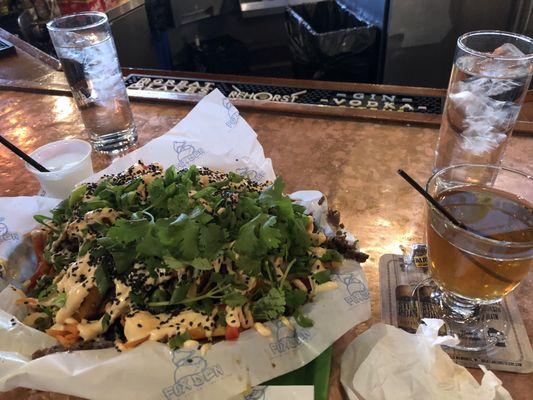 Nachos & root beer member drink of the month!  I airways walk the long way back to my seat at the bar(Great Lakes Distillery).