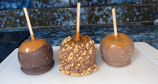 caramel apples (dark chocolate sea salt, peanuts with chocolate, and milk chocolate sea salt)