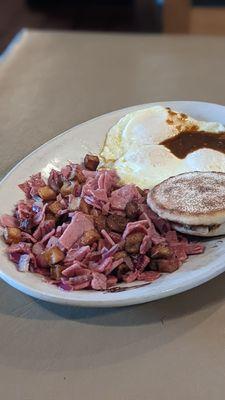 Corned beef hash, over easy eggs, English muffin