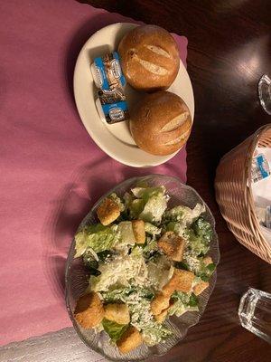 Fresh, warm baked rolls and caesar salad