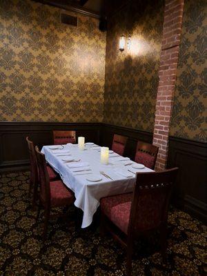 Formal dining table for six downstairs in bar area