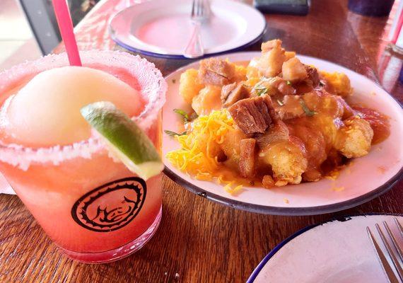 Frozen strawberry margarita. 5 stars. Green chile pork bellies tator tots. 4 stars.