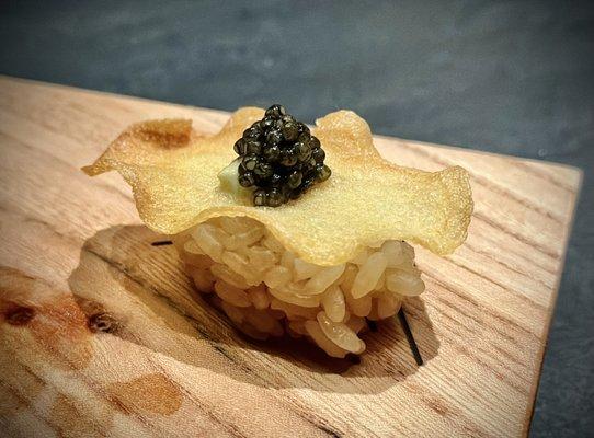 Homemade potato chip with caviar