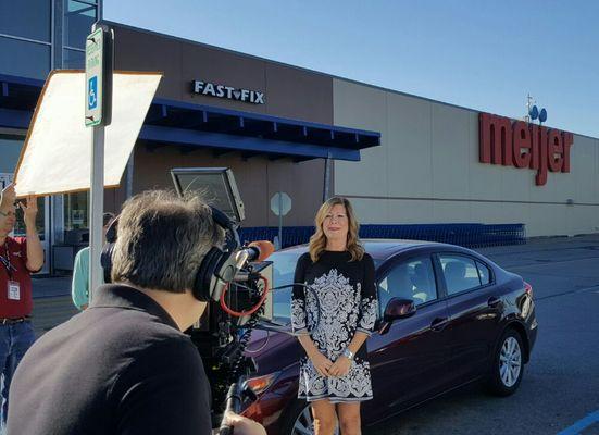 Filming TV ad for Fast-Fix stores located inside Meijer