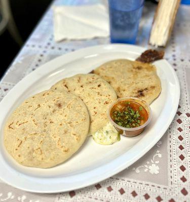 Pupusas: revuelta, queso con loroco, and birria with consome