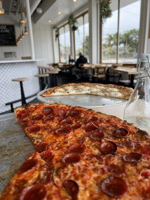 Killer Bee (front) and Cacio e Pepe pizzas