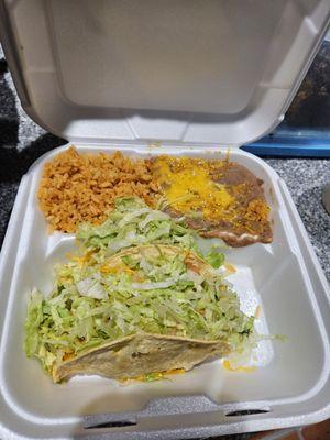 #1 combo plate - 2 tacos, rice and beans (but really 75% lettuce)