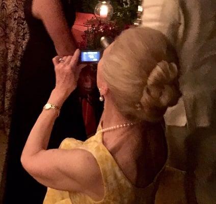 An elegant up do for an evening party. Pretzel bun with jeweled pins for an extra sparkle.