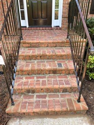 Tuck point steps and fixed loose brick around rails