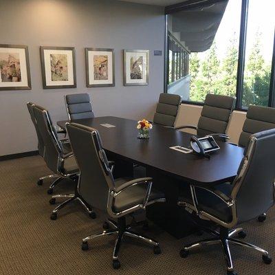 PS Conference Room - view of one of the art gallery walls featuring "CityScapes" photography from around the region.