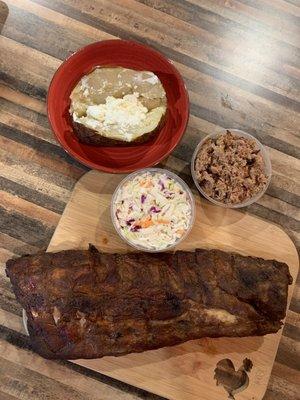 Full slab ribs, small coleslaw, small pulled pork and baked potato with sour cream and butter