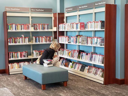 Browsing nonfiction on the second floor at 227 S. Seventh St.