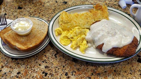 Chicken fried steak and eggs