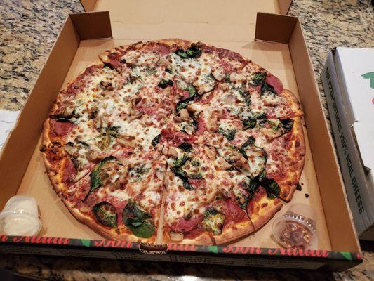 Choice of 3 topping large pizza - special for $10.99. Chose pepperoni, spinach and mushrooms.