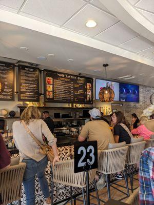 Bar with Menu board and tvs