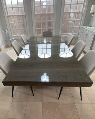 Take at this table top we installed in Flower Mound, TX. This looks so shiny and smooth, plus it's easy to keep clean and protects the wood!