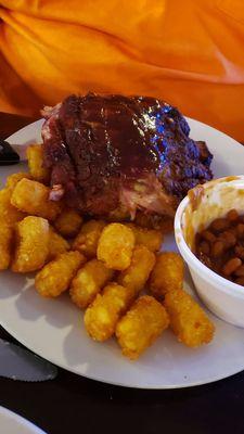 Ribs, baked beans, tots, pork loin