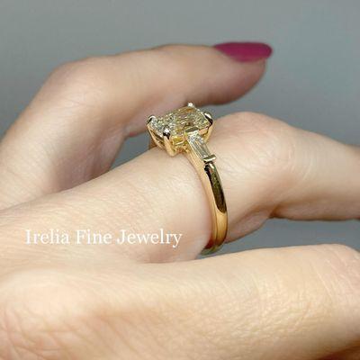 3 Stone Diamond Ring in 14k yellow gold with tapered baguettes