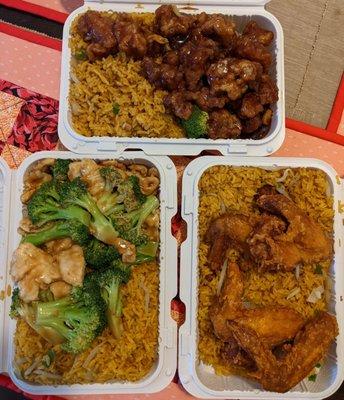 Clockwise from top: General Tso's Chicken, fried chicken with Shrimp fried rice, and chicken with Broccoli