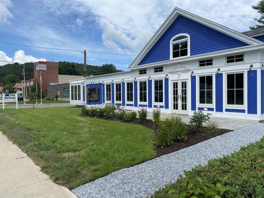 The "front" of 63 State Rd. facing the street as you drive by, but the parking lot and entrance is in the back.