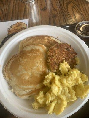 Pancakes, scrambled eggs and salmon cake