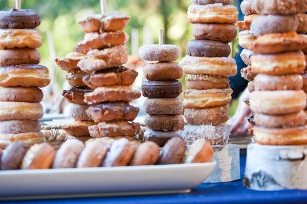 Donut "forest" dessert table in lieu of wedding cake